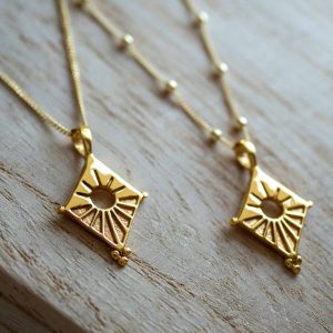 Gold passage pendants both chains